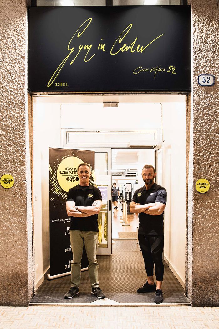 Angelo e il socio davanti all’ingresso di Corso Milano 52
